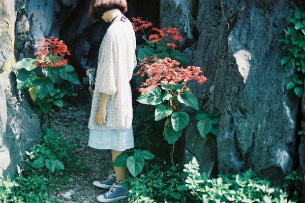 How to Layer Dresses and Sweaters for a Trendy but Warm Winter Look in the UK?